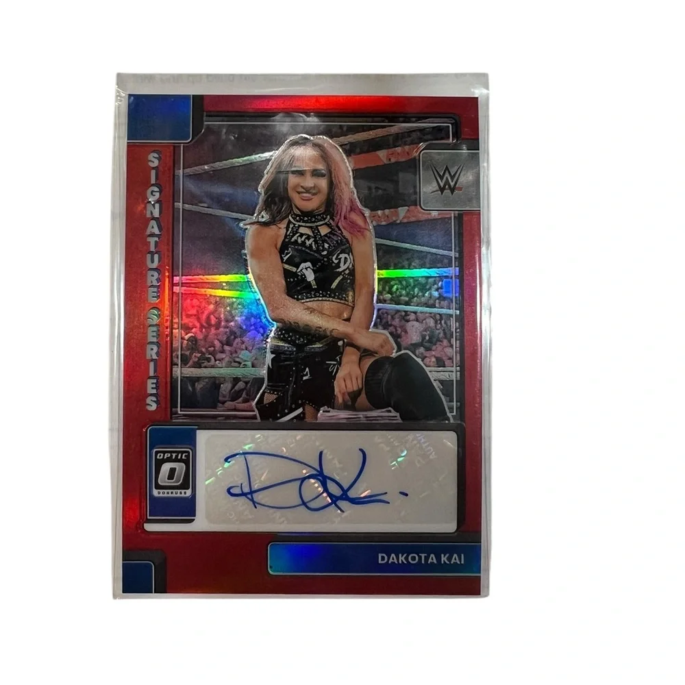 2023 Panini Chronicles WWE Dakota Kai Optic Signature Series Red Auto #DO-DAK SP